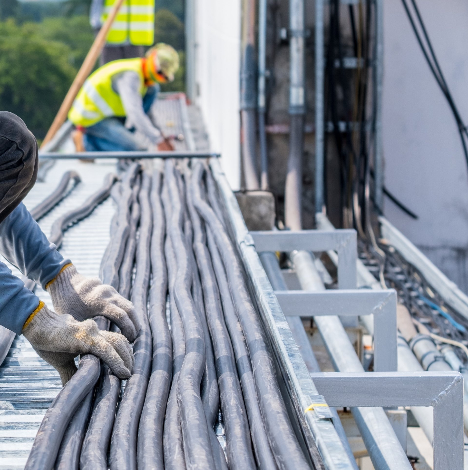 Electrical workers performing turnaround maintenance on industrial equipment